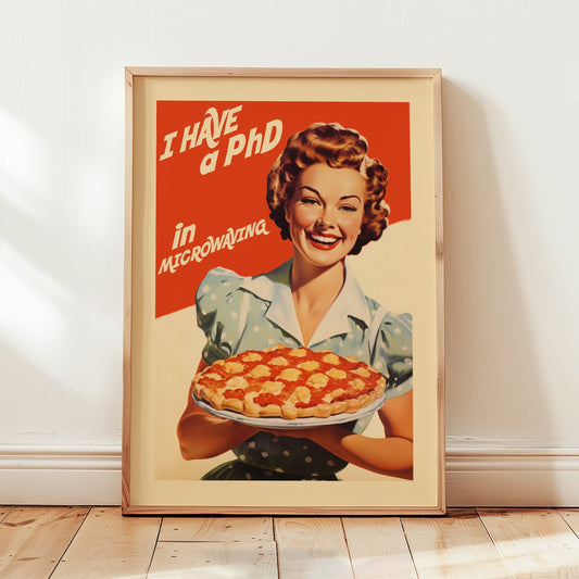 Retro housewife holding a pie with the quote “I Have a PhD in Microwaving,” vintage diner style funny kitchen wall art poster for mid century kitchen decor.