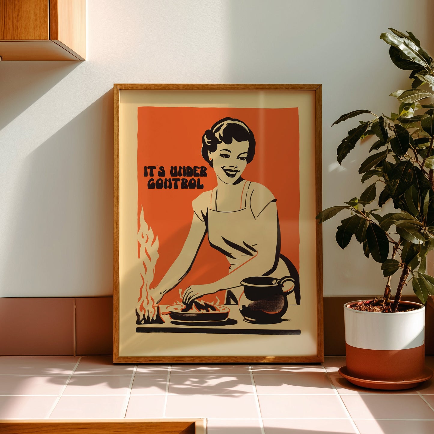 Retro housewife cooking with flames and the text “It’s Under Control,” nostalgic funny kitchen wall art poster for retro cafe or home kitchen decor.
