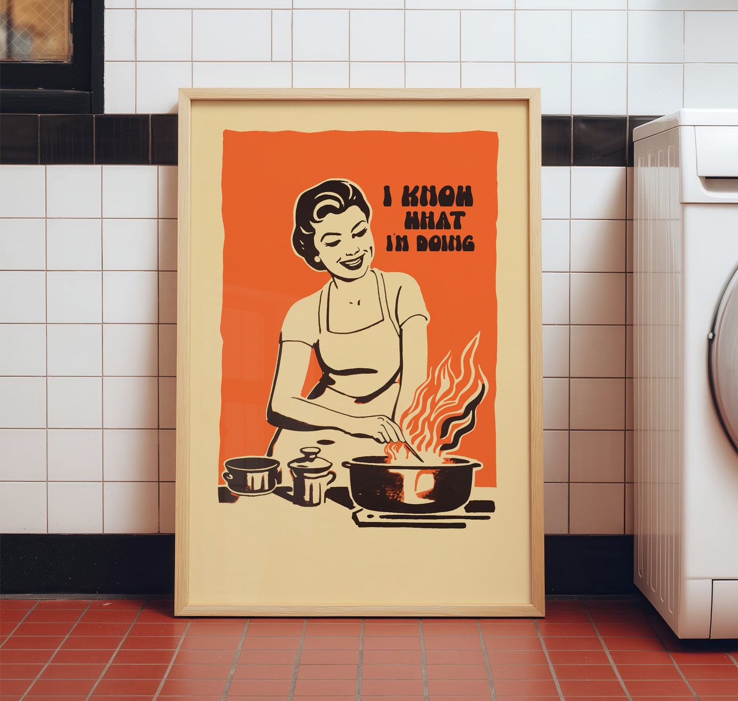 Midcentury housewife cooking over flames with the text “I Know What I’m Doing,” nostalgic retro kitchen wall art print for family kitchen decor.