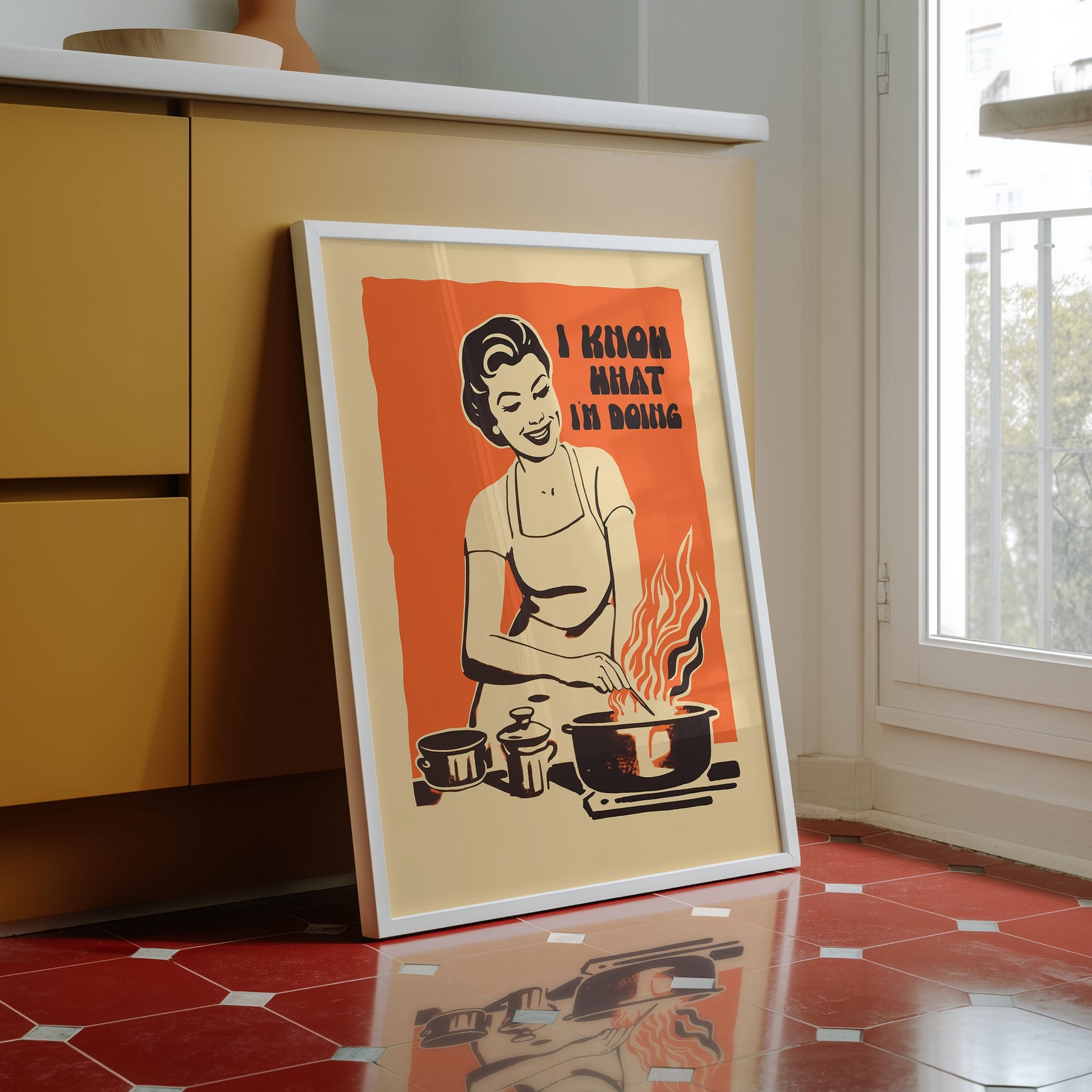 Midcentury housewife cooking over flames with the text “I Know What I’m Doing,” nostalgic retro kitchen wall art print for family kitchen decor.