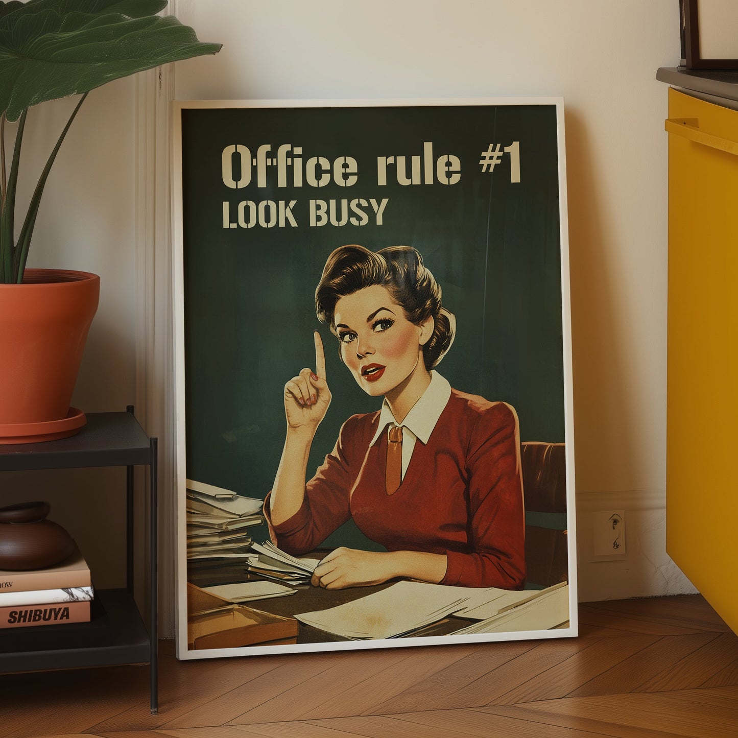 Retro office woman at a desk with the text “Office rule #1 Look Busy,” funny nostalgic office wall art for cubicle or work from home decor.