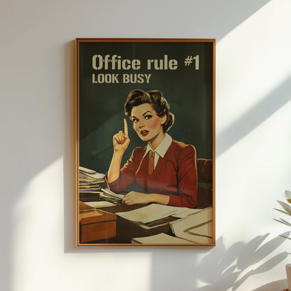 Retro office woman at a desk with the text “Office rule #1 Look Busy,” funny nostalgic office wall art for cubicle or work from home decor.
