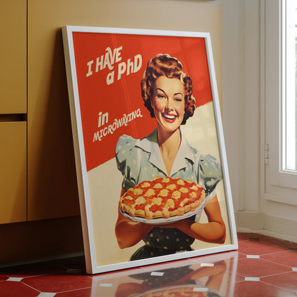 Vintage-style illustration of a smiling 1950s housewife in a blue polka dot dress holding a pie, with the text 'I Have a PhD in Microwaving' on a red and white background; humorous retro kitchen wall art.