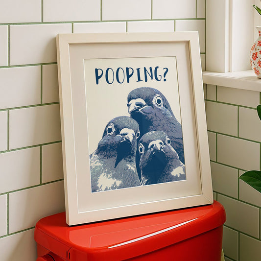 Graphic illustration of three blue pigeons staring directly at the viewer with the word 'POOPING?' written in bold blue text above them; funny bathroom wall art.
