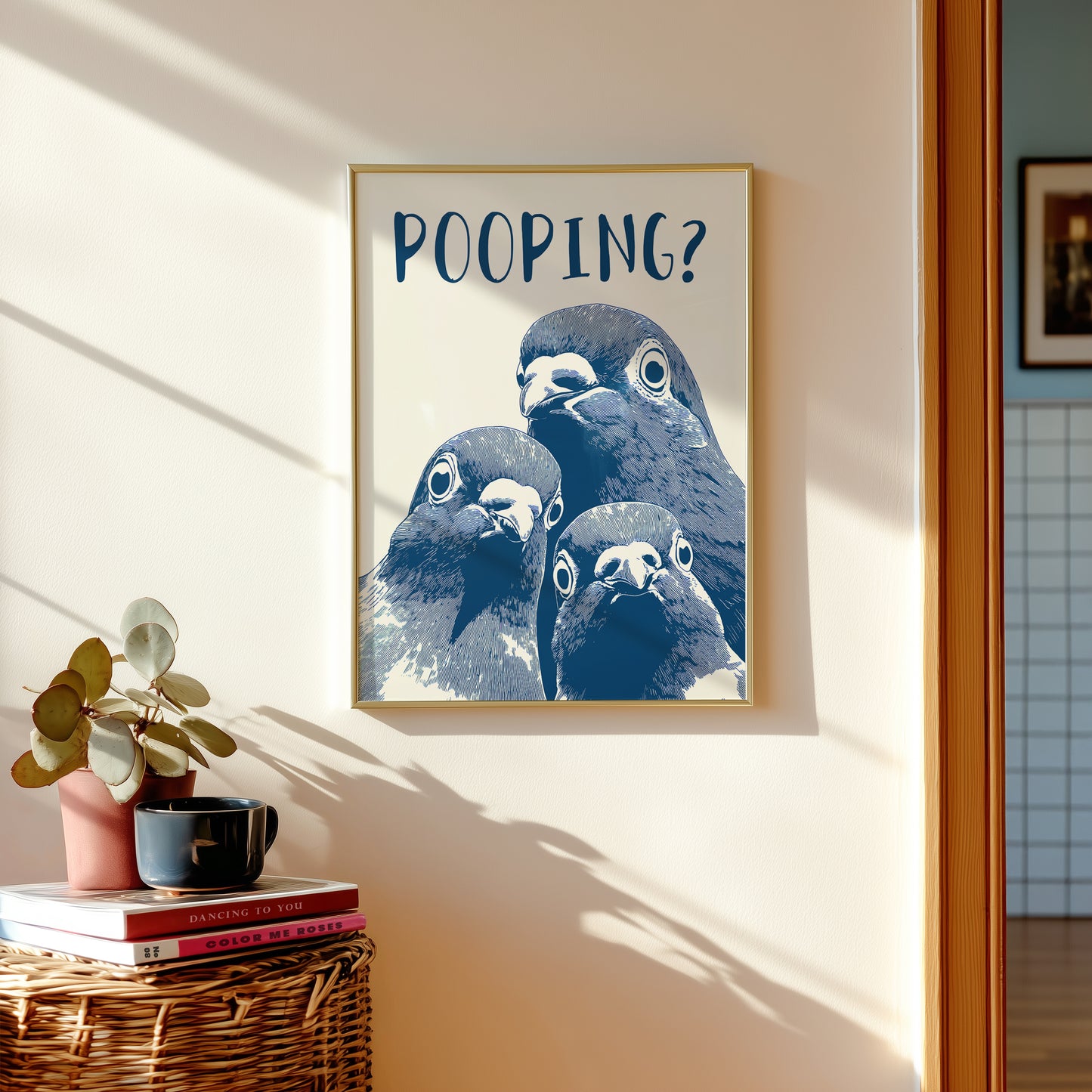 Graphic illustration of three blue pigeons staring directly at the viewer with the word 'POOPING?' written in bold blue text above them; funny bathroom wall art.

