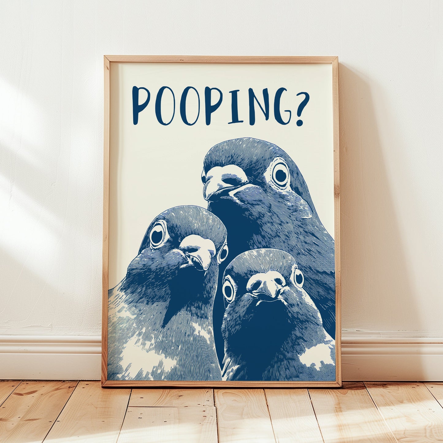 Graphic illustration of three blue pigeons staring directly at the viewer with the word 'POOPING?' written in bold blue text above them; funny bathroom wall art.
