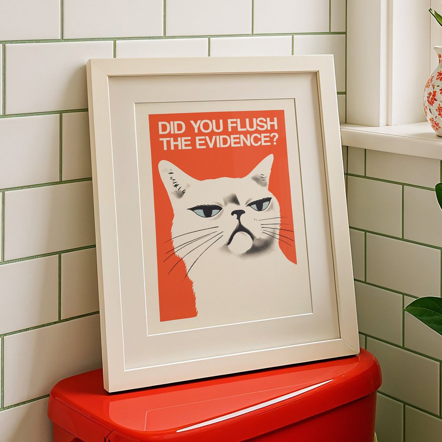 Illustration of a white cat with a suspicious, judgmental expression set against a vibrant red background with the text 'DID YOU FLUSH THE EVIDENCE?' in bold white uppercase letters; funny red and white bathroom wall art.