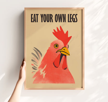 Bold retro illustration of a red chicken rooster with the provocative text "Eat Your Own Legs" in a vintage font, cream background, activist kitchen wall art.
