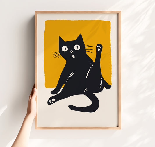 A minimalist linocut-style illustration of a goofy black cat sitting with one leg high in the air, licking itself against a vibrant mustard yellow square background.