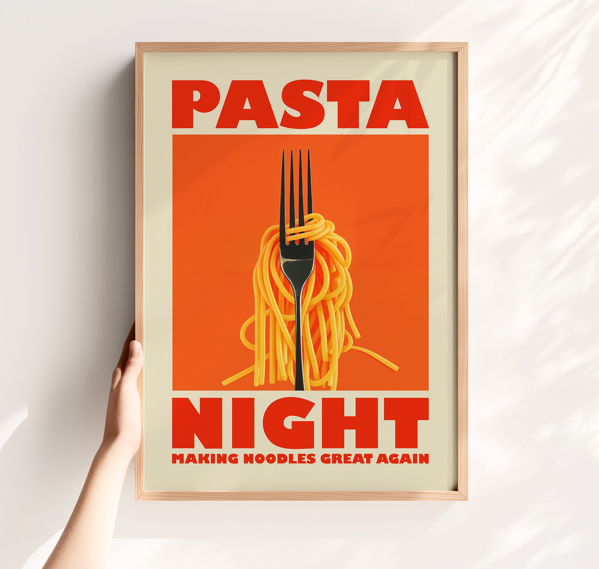 Retro-style kitchen poster with a fork twirling spaghetti on an orange background, featuring the text "Pasta Night" and "Making Noodles Great Again" in bold red letters.
