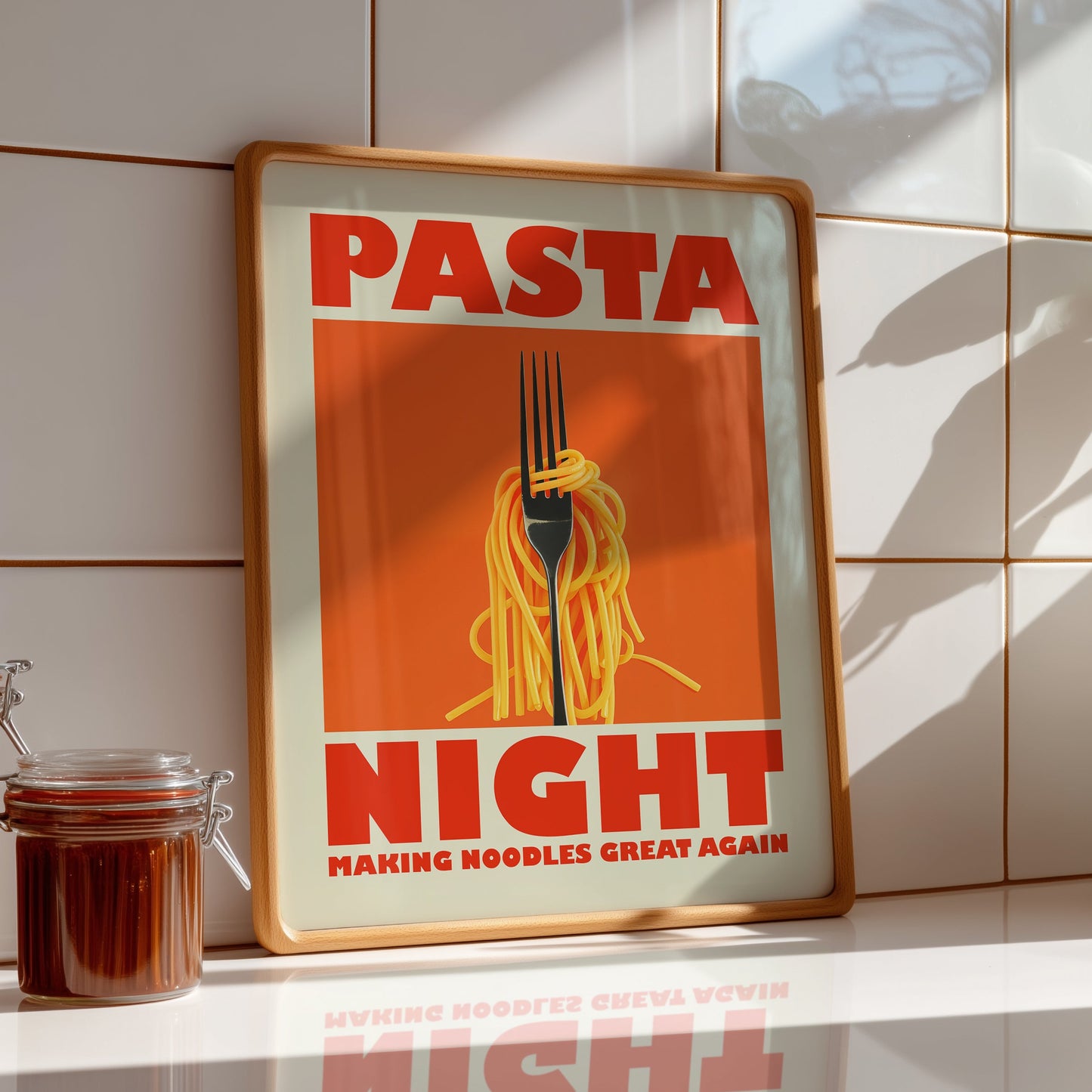 Retro-style kitchen poster with a fork twirling spaghetti on an orange background, featuring the text "Pasta Night" and "Making Noodles Great Again" in bold red letters.

