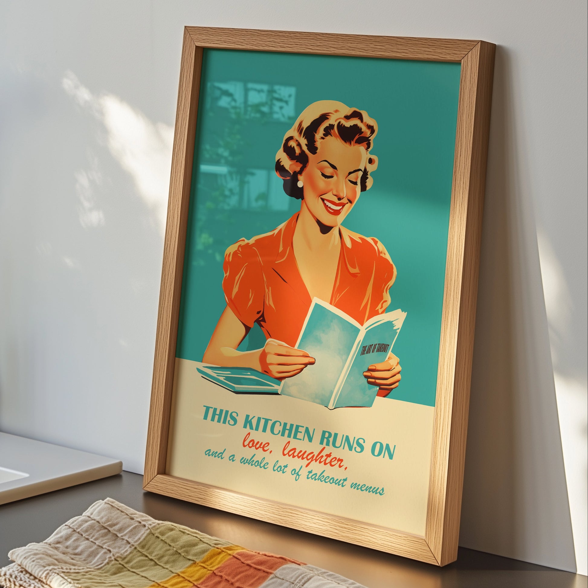 A 1950s-style vintage illustration of a smiling woman in a red dress reading a book. The background is a vibrant teal. Below her is the text: "THIS KITCHEN RUNS ON love, laughter, and a whole lot of takeout menus" in a mix of bold and script typography.