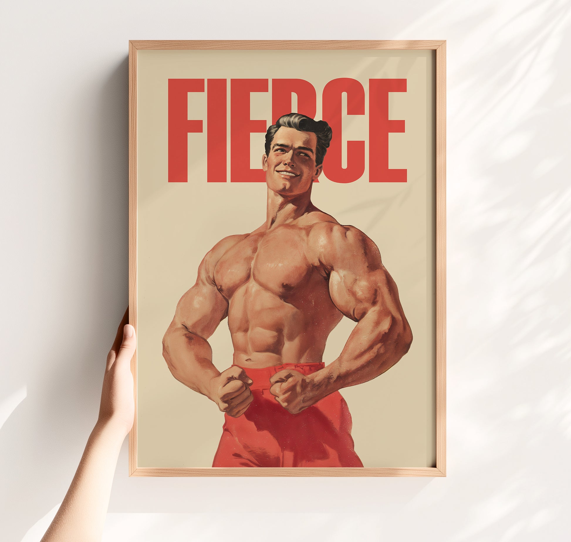 Vintage-style bodybuilding poster with the word "FIERCE" in bold red text above a muscular man in a classic posing stance, retro propaganda gym wall art.