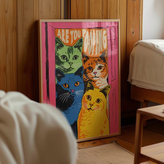 Funny 'Are You Pooping' cat poster with four colorful green, orange, blue, and yellow cats in a pink doorway, retro maximalist bathroom wall art matte print.