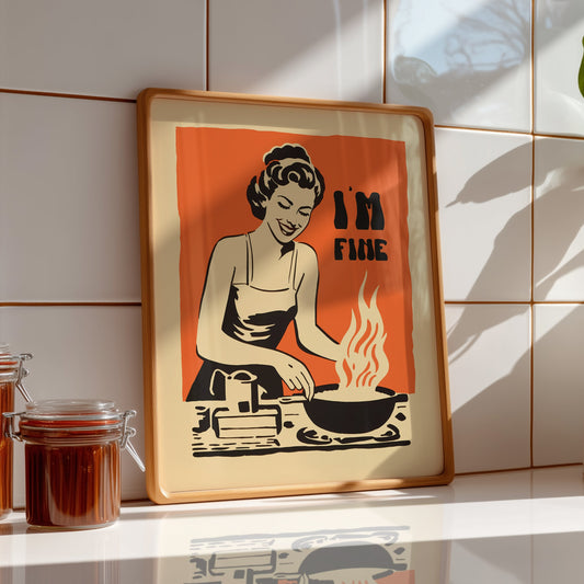 Retro housewife cooking with flames in a pan and the text “I’m Fine,” vintage style funny kitchen wall art poster for retro cafe or kitchen decor.